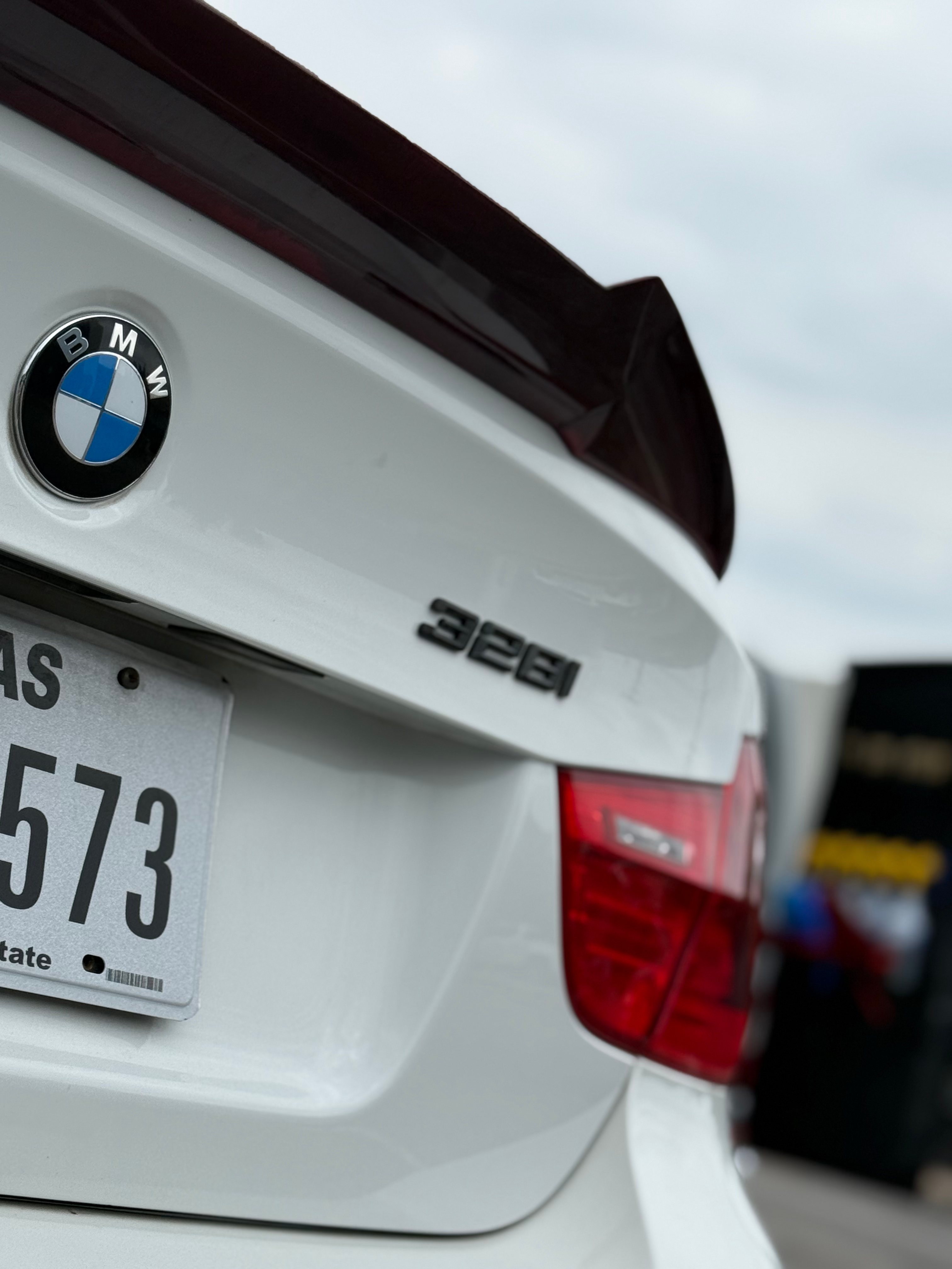 BMW trunk badge detailing - attention to detail on exterior emblems Austin